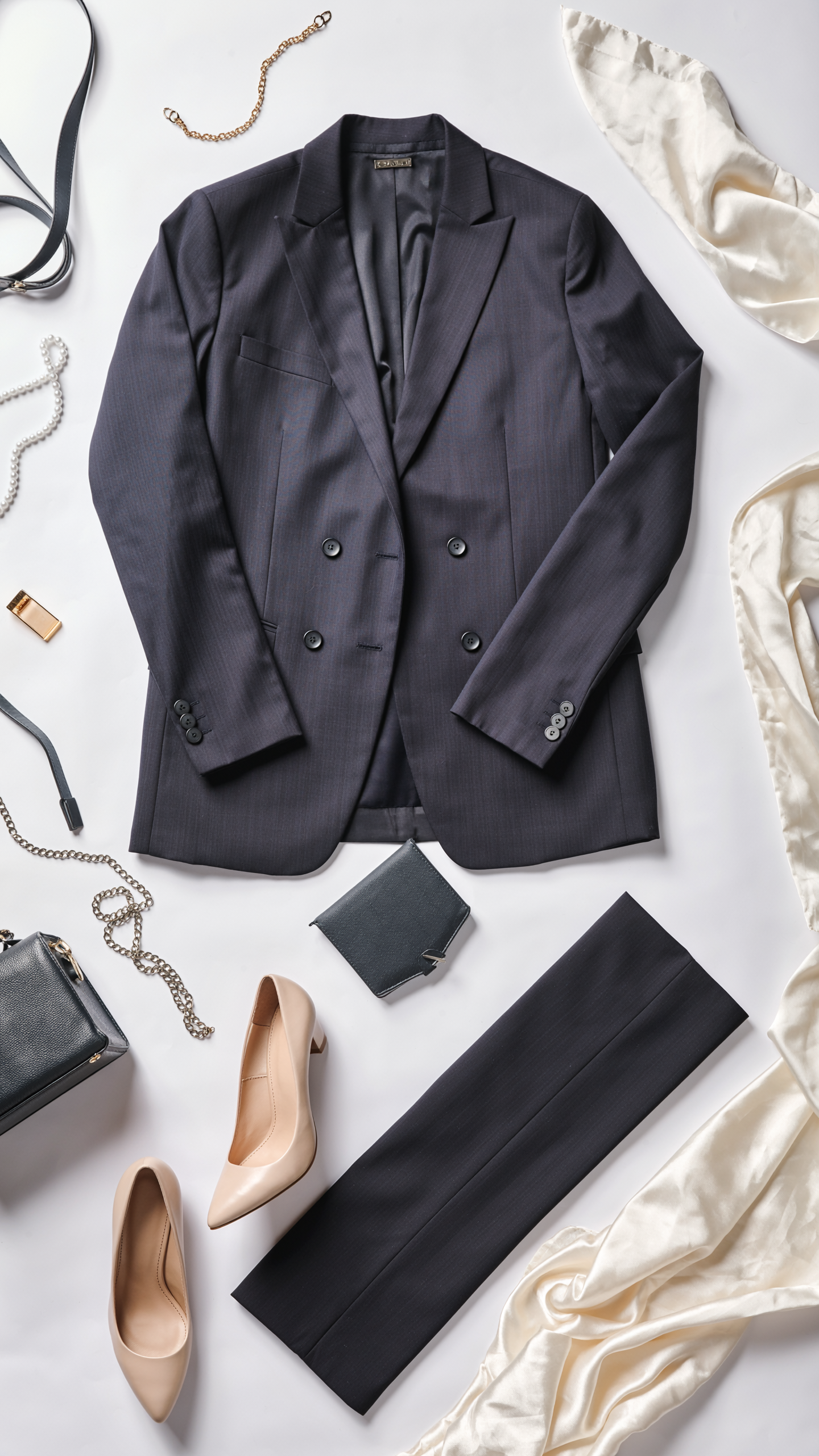 Elegant Formal Outfit with Dark Blue Blazer and Sophisticated Accessories